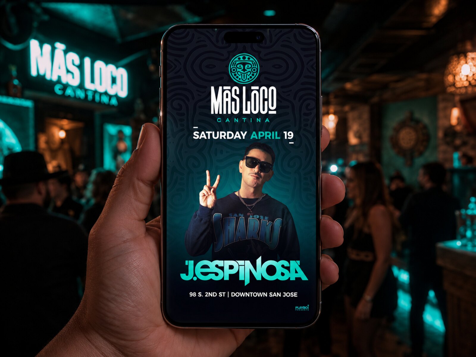 Más Loco Cantina event flyer on a phone in the venue